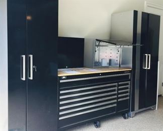 Large assortment of Husky and New Age Steel Workbenches and Cabinetry