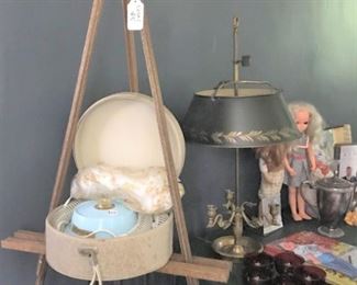 Artist's easel, vintage hair dryer, bouilloite lamp, vintage toys and housewares