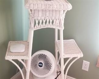 Whimsical wicker plant stand