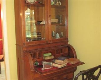 Bookcase with roll top desk believed to be from Saline County, MO