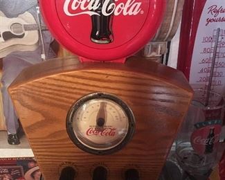We have (2) of these Cool  Wooden  Coca-Cola Clock 1934 Style  Radios with Light at Top