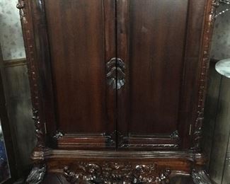 Gorgeous Small Carved Mahogany Armoire with 2  Shelves 
(Height 53”, Width 33”,  24” Deep)
    Great for Bedding, Television Etc! 