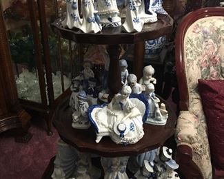 Lovely 3 Tier Antique Table Full Of 
   Beautiful Blue & White Figurines