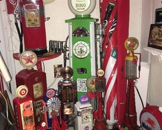 Cool Collection Of Gas Pumps Some are Lamps and Have Clocks
     Great Decor!!!