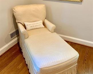 Upholstered chaise with skirt