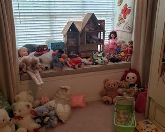 this room is packed with toys and stuffed animals from the 1980's