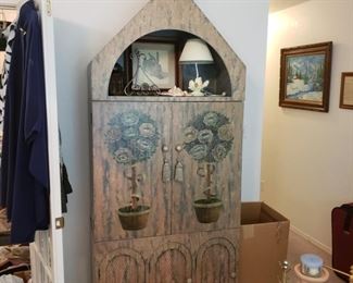 lovely painted cabinet in the master bedroom