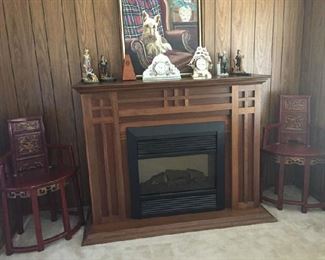 beautiful fireplace, works great, puts out heat and beautiful wood design. $275