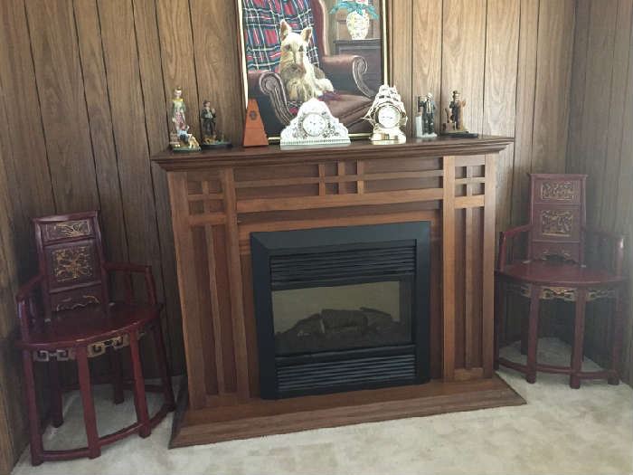beautiful fireplace, works great, puts out heat and beautiful wood design. $275