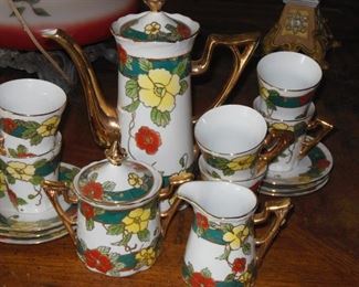 Elaborately Decorated Coffee, Sugar and Cream Set