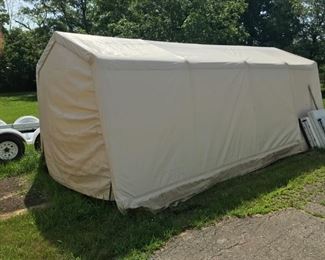 12 ft. x 22 ft. storage automobile shed sold new for $195 at Menards.  Now $125. (off site)