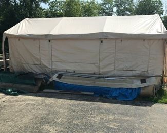 12 ft. x 22 ft. party tent with fold up sides sold new $250 now $175 (off site)