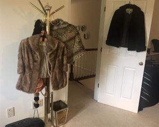 Faux fur coats and a vintage ocelot cape (real)