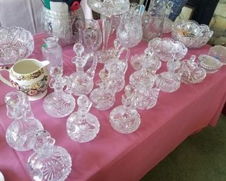 Several cut glass cruets and assorted dishes and bowls.