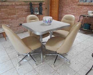 vintage dinette table, swivel chairs, etc.