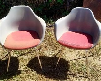 Pair of fiberglass bucket arm chairs