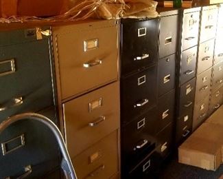 over 2 dozen file cabinets