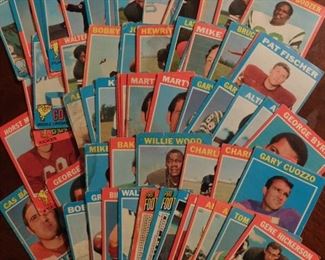 large collection of aprox 389 sports trading cards. Majority are football, many are baseball, and a few are basket ball. Will be taking bids on collection