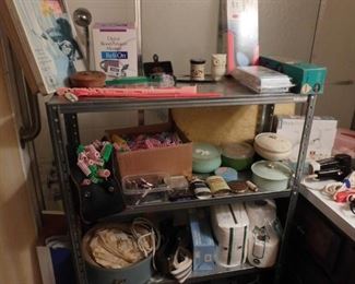 bathroom. Vtg rollers, hair dryer, powder boxes