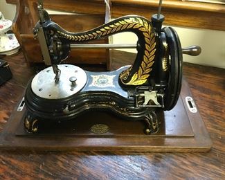 1880 to 1909 Jones Hand Sewing Serpentine Swan Neck Brass Badge sewing machine with wooden box