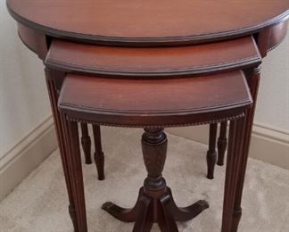 Beautiful set of mahogany nesting tables with claw feet