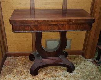 Antique gaming table is a great find. Some discoloration from sun on top, but see just great.