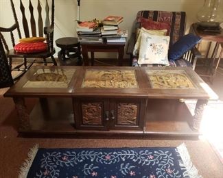 Inlaid carved teak coffee table is a feat of amazing workmanship.  Will be a focal piece of any room