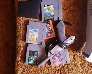 Vintage Nintendo games and gun