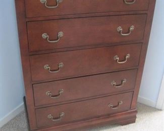 A 5 piece sleigh style king size bedroom set with bedding included.