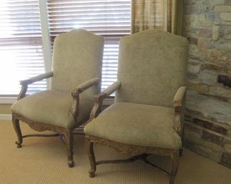 A pair of High Back Armchairs.