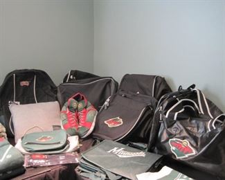 Lots of Minnesota Wild and New Jersey Devils Hockey bags, hats and misc. accessories.