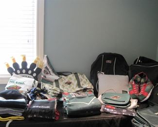 Lots of Minnesota Wild and New Jersey Devils Hockey bags, hats and misc. accessories.