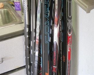 Dozens of Hockey Sticks.