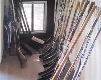 Dozens of Hockey Sticks.