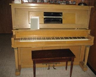 Here's the piano that plays the rolls. Needs work. Has ivory keys. Beautiful wood can be repurposed as can the keys!