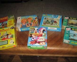 Yes, that is Mickey and Minnie and the Bobbsey Twins, puzzles even complete!