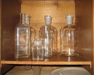 Laboratory bottles and old finds from the beach. Also test tubes and other lab accessories!