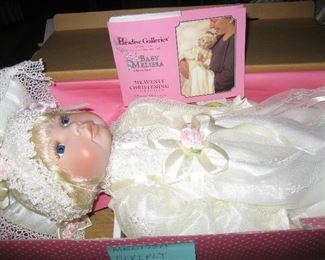 Baby Melissa is a beautiful porcelain doll in a christening dress! Includes pillow.