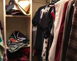 2 closets of women and men’s clothing items 