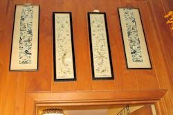4 framed oblong panels