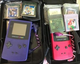 Nintendo game boys with lots of games