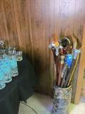 A large assortment of walking canes