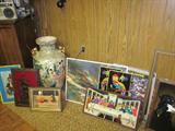 Assortment of paintings and artwork along with a large Japanese style floor vase.