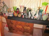 Side buffet with lift-up shelves. So many gorgeous vases!