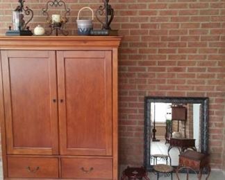 Hooker entertainment center (doors closed), wall mirror, metal square plant stand, black metal SLaH stand, wooden urn stand 