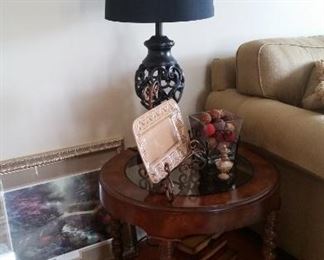 Barley-twist round end table with glass top, black table lamp, 2 storage boxes, metal bracket with ceramic tray, square glass container with decor balls