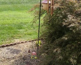 Garden shepherd hook, several more available not in photo, wind chime, ceramic birdhouse, small garden hook