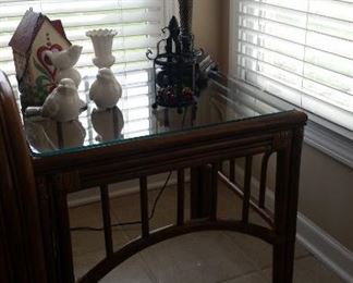 Benchcraft rattan side table with glass table topper, table lamp, white ceramic birds & small urn pot, cute birdhouse, & small metal candle lantern