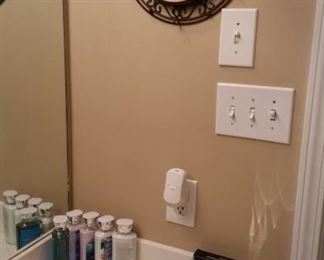 Lotion, mirrors, & wall clock