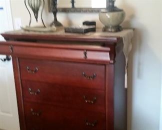 Highboy dresser with felted jewelry drawer (open slightly), new lamp, dresser runner, decorative accent balls, wall mirror, Southern Living at Home larger candle hurricanes  (on floor)
